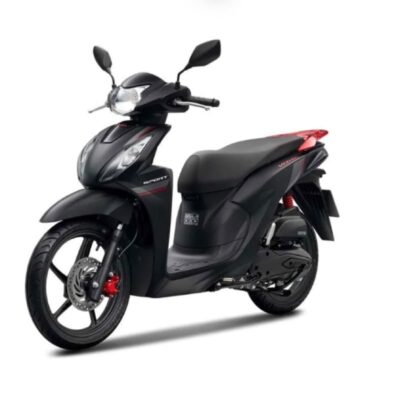 Xe tay ga Honda Vision màu đen, điểm nhấn đỏ, nhìn nghiêng từ phía trước.